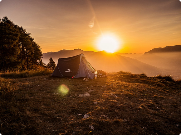 Camping tent at sunset